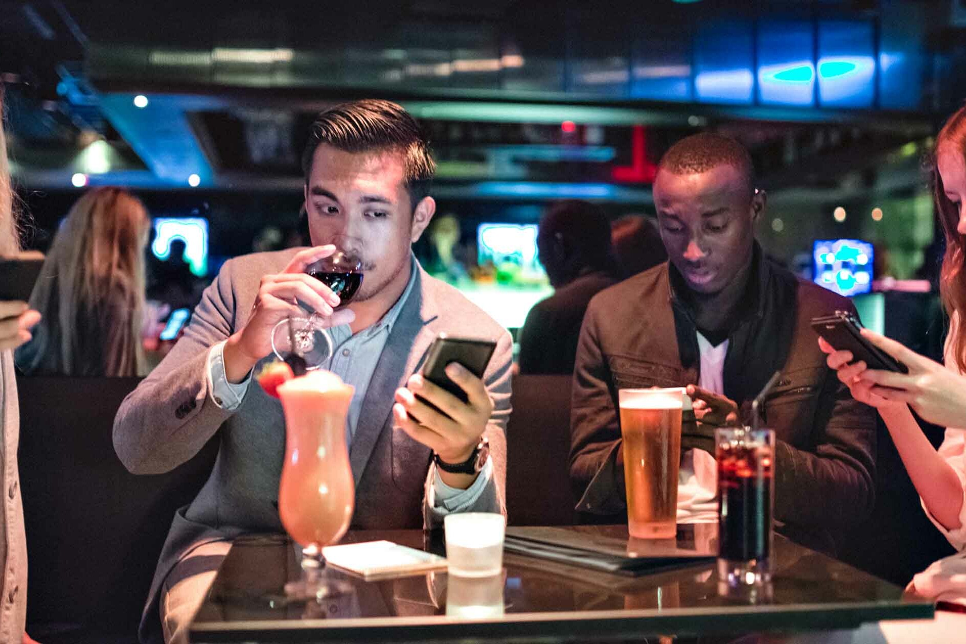 Group of Friends Online Dating in a Bar