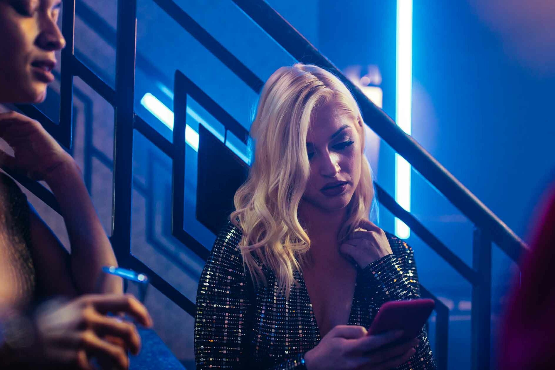 Woman in Club on her Phone Ghosting